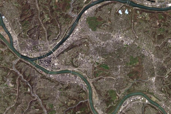 Satellite view of Pittsburgh, Pennsylvania, showing rivers, mountains, and buildings